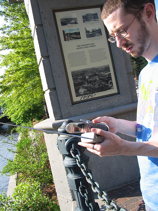 Making a live radio transmission by the Providence Canal