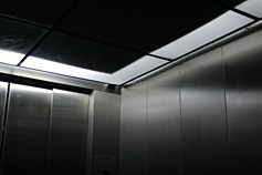 Detail of Rapture/Rupture, elevator door, ceiling, and left front corner